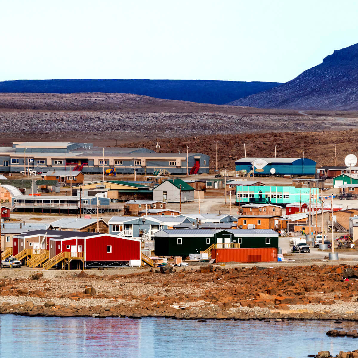 Houses on the coast line of Ulukhaktok Northwest Territories in Canada. Housing Rights